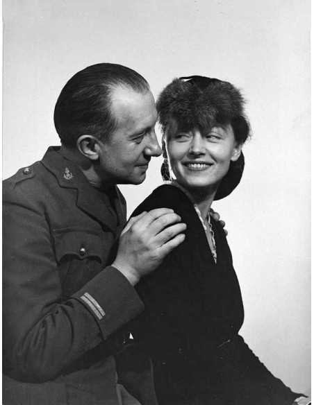 Paul and Nusch Eluard Paul Eluard as a soldier, in profile behind N...