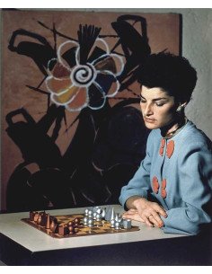 Juliet (chess) woman in front of chessboard painting in background ...