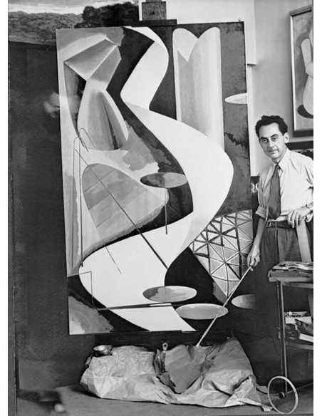 Man Ray peintre Man Ray debout devant un chevalet avec une toile en...