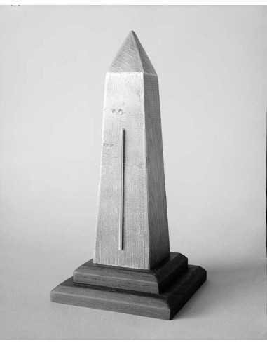 Proverb On a wooden obelisk model is glued, like a thermometer, a k...