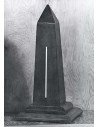 Proverb On a wooden obelisk model is glued, like a thermometer, a k...