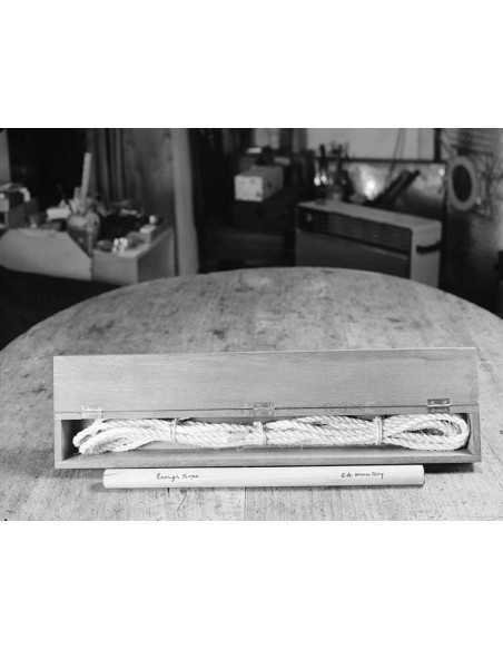 Enough rope Long wooden box containing a stick and a rope edition i...
