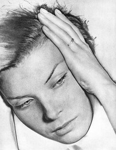 No title (hand against head) Face close-up, hand with wedding ring ...