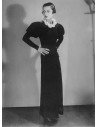 Lilian Strauss portrait of woman in long black dress with white bow...