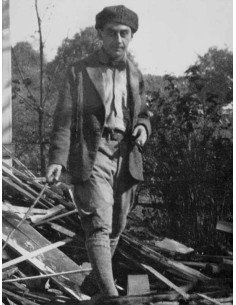 Man Ray, Ridgefield portrait young man beret forest log wood in Rig...