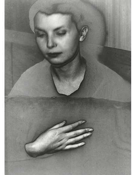 Gabriela Mistral portrait of a woman, hand standing out against bla...