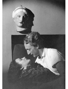 Couple under Venus - Prayer serie A couple lays on a sofa in a kiss...