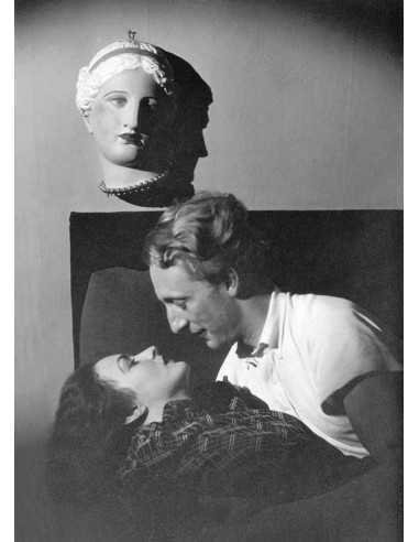 Couple under Venus - Prayer serie A couple lays on a sofa in a kiss...