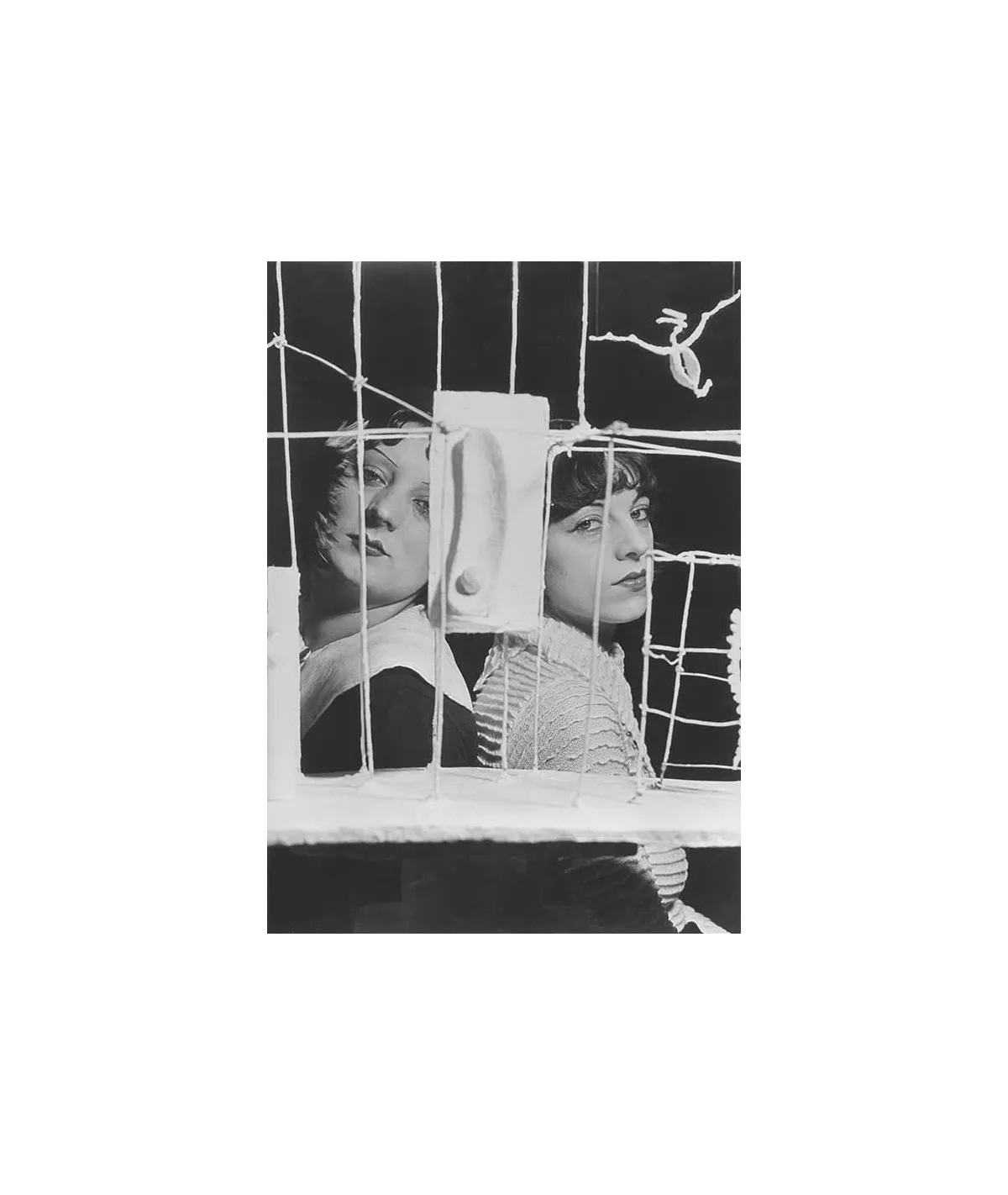 manray|Man Ray photo / TELIMAGE|Kiki et Lili behind "Le Palais à Quatre Heures du Matin"||Women