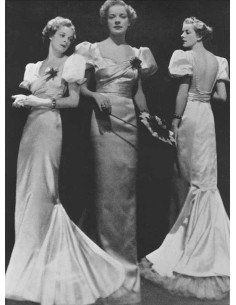 Dress by Schiaparelli three models in different poses to present a ...