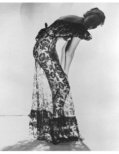 undressed model woman in housecoat bending profile undressed